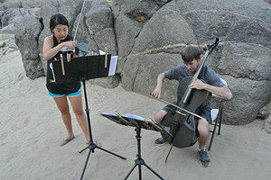 Clancy Newman and Kristin Lee perform his composition "Golden Blues" at a camp site along the Colorado River.