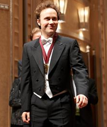 Alexander Schimpf accepts the Mixon First Prize at the Cleveland International Piano Competition.