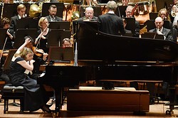 David Robertson, right, conducts the Dallas Symphony Orchestra with pianist Orli Shaham as they perform Bernstein's Symphony No. 2 The Age of Anxiety.